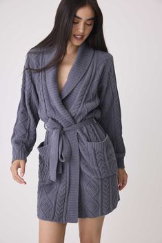 Wrap yourself in luxury with our Women’s Chenille Cozy Cable Shawl Collar Robe. Crafted from plush chenille with a beautiful cable texture, this robe offers unparalleled softness and warmth. The classic shawl collar provides an extra touch of comfort, while the tie-waist allows for a customizable fit. Perfect for lounging at home or unwinding after a long day, this robe combines style and coziness in one indulgent package. Winter Blouses, Mohair Cardigan, Mohair Sweater, Grey Pullover, Long Day, Loungewear Shorts, Boutique Design, Men's Knit, Wool Dress