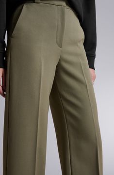 Achieve desk-to-dinner perfection in these sophisticated stretch-kissed pants fashioned with a high waist and wide legs. Zip fly with hook-and-bar closure Front slant pockets; back welt pockets 62% polyester, 34% viscose, 4% elastane Dry clean Imported