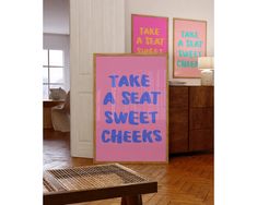 there is a sign that says take a seat, sweet cheeks and take a seat