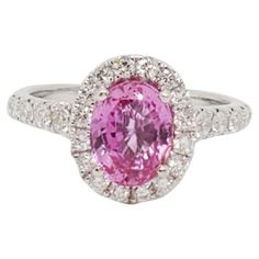 Gorgeous 2.06 ct. bright pink sapphire oval with 0.70 ct. good quality white diamond rounds. Handmade in 18k white gold in ring size 6.25. GIA certificate included. Sapphire Cocktail Ring, Gia Certificate, Gold Cocktail Ring, Purple Sapphire, Gold Cocktail, Diamond Cocktail Rings, Antique Pink, Green Sapphire, Brown Diamond