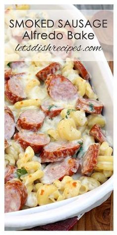 a close up of a plate of food with pasta and sausage on it, text reads smoked sausage alfredo bake