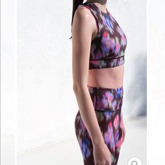 Ivl Collective Blurred Floral Sports Bra Size 8 Multicolor Sleeveless Sports Bra For Yoga, Multicolor Stretch Activewear Bra Friendly, Purple Sleeveless Sports Bra For Yoga, Purple Moisture-wicking Sleeveless Sports Bra, Purple Moisture-wicking Sports Bra, Fitted Purple Racerback Activewear, Purple Athleisure Activewear With Built-in Bra, Purple Sleeveless Activewear, Purple Sleeveless Activewear For Training