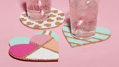 three coasters with ice cream and hearts on them, one has a drink in it