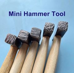 four wooden mallets lined up next to each other with the words mini hammer tool