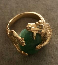 "Vintage Estate 14K 16.3 g Dragon Eating Green Jade Ring. Size: 9. Jade- 3/4\"x1/2\". Markings: 14K ( Ring was resized so the mark have been partially erased but still show partial markings). Amazing large piece. Dragon represent luck. Dragon eating jade signifies abundant wealth, luck and good health attained. Beautiful Details. Sold as is. Pre- Owned." Green Ring Aesthetic, Green Jewelry Aesthetic, Dragon Protecting, Jade Aesthetic, Luck Dragon, Azurite Ring, Eating Green, Green Jade Ring, Jade Rings