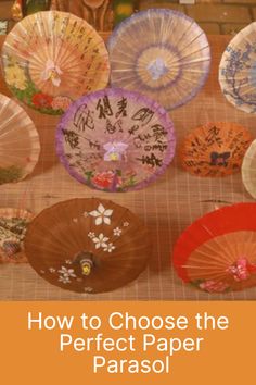 there are many umbrellas with writing on them and the words how to choose the perfect paper parasol