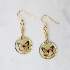 EAR-JM Round Monarch Butterfly Earrings Round Metal Crystal Earrings For Gift, Gift Metal Crystal Earrings, Gift Crystal Earrings In Metal, Silver Hypoallergenic Copper Earrings, Bronze Hypoallergenic Metal Jewelry, Hypoallergenic Bronze Metal Jewelry, Clear Metal Drop Earrings, Hypoallergenic Bronze Metal Earrings, Nickel-free Gold Metal Crystal Earrings