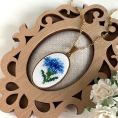 Dainty blue cornflower necklace is a wonderful gift for women. Jewelry pendant with small flower is a wonderful gift for daughter, sister or best friend women. Simple floral necklace is suitable for every day and for a special occasion. This jewelry perfect accessory for complete your summer look. This pendant is made in the technique of micro-embroidery cross stitch on cotton canvas with cotton threads.  The size of each cross stitch is less than 1 mm. MATERIALS: The color of the base and chain Blue Jewelry For Mother's Day Gift, Blue Jewelry Gift For Mother's Day, Oval Pendant Necklace With Flower Charm As Gift, Blue Jewelry For Best Friend Gift On Mother's Day, Dainty Blue Birth Flower Jewelry, Dainty Flower Pendant Necklace As Gift, Blue Flower-shaped Jewelry For Her, Blue Flower Necklace For Gifts, Blue Personalized Necklace For Mom