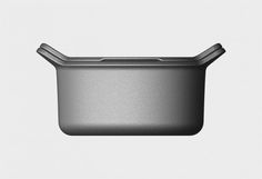 an aluminum pan with lid is shown on a white background in this image, there are no visible objects