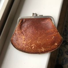 Such a cool old double-compartment coin purse! Made of leather & metal, the leather is wonderfully aged and the metal clasp has a patina of rust. Purse is 4-3/4 x 3-1/2 inches; circa 1910-20. Other items are not included. Visit my shop! www.veraviola.etsy.com Vintage Brown Wallets With Card Slots, Vintage Compact Coin Purse With Card Slots, Vintage Wallet With Coin Pocket, Vintage Wallets With Coin Pocket For Everyday, Vintage Coin Purse For Everyday Use, Vintage Brown Wallet With Coin Pocket, Brown Vintage Wallet With Coin Pocket, Vintage Compact Coin Purse For Everyday, Vintage Compact Wallets With Card Slots