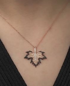 Produced from 925 sterling silver, the Sycamore Leaf Necklace elegantly reflects the power and beauty of nature. This necklace, which combines the symbolic meaning of the sycamore leaf with modern design details, is specially designed for strong and original women. Leaf details shaped with fine workmanship combine with the brilliance of silver to create a natural glow on your neck. This necklace, which is an ideal choice to complement your daily elegance or to add a touch inspired by nature to y Nature-inspired Sterling Silver Necklace, Nature-inspired Rose Gold Pendant Necklace, Nature-inspired Sterling Silver Necklace For Anniversary, Sterling Silver Nature-inspired Necklace For Anniversary, Nature-inspired Sterling Silver Leaf Necklace, Rose Gold Leaf-shaped Jewelry For Gifts, Leaf-shaped Sterling Silver Jewelry For Anniversary, Nature-inspired Leaf Shaped Sterling Silver Necklace, Rose Gold Leaf-shaped Jewelry Gift