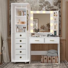 a white vanity with drawers and lights on the top is shown in front of a wallpapered background