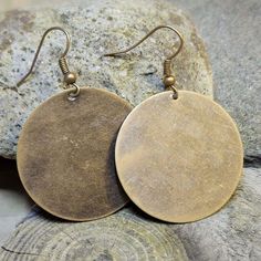 "Make a statement with these Large Bronze Tone Circle Charm Earrings. Featuring thin, lightweight charms with a flat finish and rustic scratched antiqued appearance, these disc earrings are the perfect addition to any boho or vintage-inspired look. The bronze ear wires make them easy to wear all day long, while the large size ensures they won't go unnoticed. Whether you're dressing up or keeping it casual, these earrings are sure to complement any outfit with their unique and eye-catching design Iron Jewelry, Round Dangle Earrings, Natural Diet, Dark Copper, Small Jewelry Box, Disc Earrings, Lightweight Earrings, Earrings Minimalist, Antique Earrings