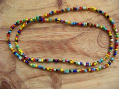 Colorful Long Beaded Necklace, Multicolor Seed Bead Necklace, Colorful Bead Necklace, Love Beads, Hippie Necklace, Boho Necklace, Men's Bead Necklace, Multicolor Beaded Necklace, Long Beaded Necklace, African Trade Bead Style Beads This super colorful necklace is made with a mix of size 8/0 and 6/0 seed beads. Some are African Trade Bead style beads. There is no clasp and it is strung on strong waterproof braided nylon. If you would like a different size then listed or would like it to have a clasp you can send me a message. I have a similar necklace with smaller beads -- check it out at https://shimmersnecklaceshop.etsy.com Rainbow Heart Shaped Beads, Rainbow Heart-shaped Beads, Multicolor Heart Beaded Necklaces With Round Beads, Rainbow Beaded Necklace With Heart Beads, Rainbow Heart Beads Necklace, Multicolor Heart Beads For Festival, Multicolor Heart Beads For Festivals, Mens Beaded Necklaces, Necklace African