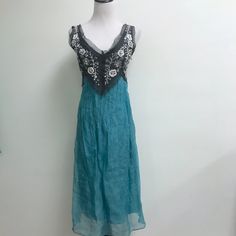 New Trelise Cooper New Zealand Dress..Size 6 ..Turquoise Blue With Black Bodice..Beaded With Pearls Sequins ..Silver Floral Embroidery...Silk Organza Sheer Layer Over Lining..Side Zip.. New Without Tags Length 39(Slip) , 42 Sheer Over Layer Bust 34 Waist 30 Hips 37 Embroidered Silk Dresses, Trelise Cooper, Silk Organza, Embroidered Silk, Black Beads, Turquoise Blue, Floral Embroidery, Silk Dress, Side Zip