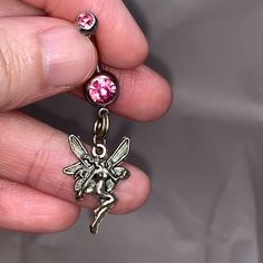 I Have Two Different Designs Of Fairy Charms. One Looks Like Tinkerbell The Other Is A More Intricate Fairy Design. This Listing Is For The Regular Fairy Design, Not The Tinker Bell One. It Has 2 Gems Both In A Medium Pink. The Charms Are Made Out Of Pewter, The Belly Rings Themselves Are 316-L Surgical Steel. I Use A Split Ring In Order To Attach The Charms So You Don't Lose Them. Each Belly Ring Is 14 Gauge. Some Of My Belly Rings Come With A Gemmed Top Ball, Some Do Not. I Do Have Extra Gemme Dangle Belly Piercing, Unique Belly Rings, Cute Belly Rings, Fairy Design, Fairy Charms, Dangle Belly Rings, Cubic Zirconia Bracelet, Fairy Jewelry, Crystal Choker Necklace