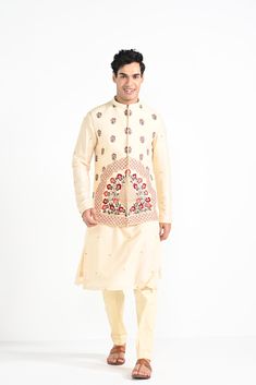 Rajasthani floral Hand embroidered nehru kurta set made in cream bamberg raw silk. Paired with cream slim fit Pant Pajama. Color of the actual garment may vary due to lighting conditions during the shoot.

Size Chart For Men





	
	
					Men's Size Chart
		

		
		
						
				Size Chart For Men
				Custom Size Measurement Guide
			
			
				
				
				Custom Size Measurement Guide
1. Take your measurements at ease…don’t hold your breath!
2. Be a little generous with the measurements. It’s always e Cream Sets With Floral Embroidery For Transitional Season, Transitional Floral Embroidered Cream Sets, Transitional Cream Sets With Floral Embroidery, Traditional Raw Silk Bandhgala In Off White, Traditional Off White Raw Silk Bandhgala, Festive Off White Raw Silk Bandhgala, Festive Cream Raw Silk Kurta, Diwali Cream Straight Kurta Sets, Traditional Off White Bandhgala For Festive Occasions