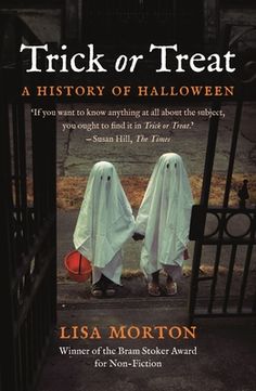 the cover of trick or treat, with two ghostly people in white robes walking through an iron gate