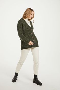 Relaxed, warming and crafted with passion. The Bonny Glen Tweed Cardigan takes the craftsmanship of Aran knitwear and blends it with the contemporary cut of modern fashion. Made with luxurious 100% Donegal Tweed, this piece is designed to champion the skill and mastery of our makers. With five beautifully finished buttons and perfectly crafted pockets on each side, this cardigan will see you through every season with ease. Stay cosy during cold winter nights or take it with you on a fresh spring Fitted Chunky Knit Wool Outerwear, Classic Wool Chunky Knit Cardigan, Wool Chunky Knit Cardigan For Work, Chunky Knit Wool Cardigan For Work, Long Sleeve Tweed Cardigan For Winter, Winter Tweed Cardigan For Work, Winter Workwear Tweed Cardigan, Grandfather Shirts, Tweed Cardigan