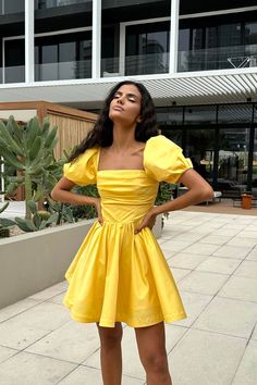 A delicate midi-length dress with the most feminine "godet" silhouette skirt in Yellow. Drapery on the bodice line is designed to ensure your look to be joyful and romantic. The garment has a fitted cut and puffy sleeves. The dress favorably emphasizes the silhouette, tightly fitting the hips, expanding to the bottom. The dress will make you feel the prettiest and good looking ever. Yellow Dress With Sleeves, Neon Yellow Dress, Neon Yellow Dresses, Draped Bodice, Be Joyful, Satin Long Sleeve, Puffy Sleeves, Hoco Dresses, Midi Length Dress