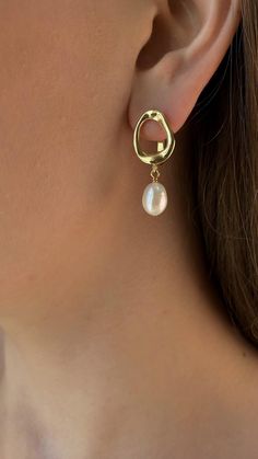 These bridal pearl drop earrings are the perfect touch of elegance for any special occasion. Featuring lustrous pearls set on a dainty gold-plated frame, these earrings bring a classic and refined look that complements both modern and traditional styles. The drop design adds a graceful movement, making them the ideal accessory to elevate your bridal ensemble or formal outfit. With their lightweight and delicate finish, these earrings are made for comfort and style throughout your day. These earrings make a thoughtful gift for brides, bridesmaids, or anyone looking for a timeless jewelry piece. Perfect for weddings, anniversaries, or as a luxurious surprise for your mom, sister, or wife, these pearl earrings are a meaningful and versatile choice. Their elegant design ensures they will be tr Bridal Pearl Drop Earrings, Bohemian Jewelry Gift, Pearl Drop Earrings Bridal, Real Pearl Earrings, Evening Earrings, Graceful Movement, Traditional Styles, Christmas Gifts For Wife, Drop Design