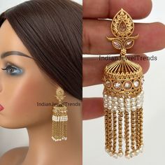 Long Gold Plated Polki Jhumka/Polki stone Jhumka/Indian Jewelry/Pakistani/Punjabi/Indian/Statement earring/Bridal earring/Indian wedding Antique Jhumkis With Gold Plating Height = 75 mm || Width = 28 mm Trendy Design Antique Earring Lightweight and elegant Can be paired with any dress Closure: Pushback This is 100% Handmade jewelry. So Color, shades, texture displayed may slightly vary from the actual product due to digital image limitations. We request you to consider these minor variations. Pl Temple Jewelry Danglers For Diwali Weddings, Diwali Wedding Temple Jewelry Danglers, Stone Work Jhumkas For Wedding, Temple Jewelry Stone Work Danglers For Wedding, Bollywood Style Intricate Design Jhumkas For Wedding, Bollywood Style Wedding Jhumkas With Intricate Design, Wedding Jhumkas With Intricate Design For Eid, Wedding Jhumkas For Eid With Intricate Design, Bollywood Style Intricate Design Wedding Jhumkas