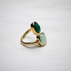 D E T A I L S - Material: Sterling Silver Stone: Aqua chalcedony & Green Chalcedony The fit: True to US ring size Finish: Smooth and gold-filled to a high shine Upgrade your accessory collection today with this must-have piece, & flaunt your style statement S H I P P I N G & P R O D U C T I O N - My current production time is 2-6 business days, which means after those days are up, your order ships! I make everything custom to order, by hand, but I promise you it's worth the wait! R U Adjustable Chalcedony Jewelry For Anniversary, Green Onyx Rings For Gifts, Green Chalcedony Gemstone Rings, Green Onyx Gemstone Rings As Gift, Adjustable Faceted Rings For Wedding, Elegant Chalcedony Rings For Gift, Adjustable Open Emerald Ring For Wedding, Elegant Green Chalcedony Rings, Adjustable Chalcedony Ring