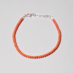 3 mm Coral  925 Sterling Silver Bracelet Details: Gemstones:Coral  Material:Sterling Silver 925 Total length: 190mm with continuous extension at 170mm Check out the full catalogue of bracelets here: https://www.etsy.com/shop/PaleoGemsJewellery?section_id=40956905 Please note that: Our jewelry pieces crafted with genuine stones, so there may be slight variations in color and shape from the images shown. Caring for gemstones: Always store your jewellery pieces individually. To maintain the gemstone's natural appearance, wash it with warm water and dry it i with a soft cloth. Avoid exposure to excessive amounts of heat and soap. Take care not to loosen or disturb the jewellery setting. Remember to  protect your jewelry from impact against hard surfaces and avoid contact with abrasive surfaces Sterling Silver Beaded Bracelets With Silver Clasp, Hand-strung Sterling Silver Rondelle Bracelets, Hand-strung Rondelle Sterling Silver Bracelets, Sterling Silver Rondelle Gemstone Beaded Bracelets, Sterling Silver Beaded Bracelets With Silver Clasp For Everyday, Sterling Silver Beaded Bracelet With Gemstone Beads, Sterling Silver Beaded Bracelets For Everyday, Orange Sterling Silver Jewelry With Round Beads, Everyday Polished Sterling Silver Beaded Bracelets