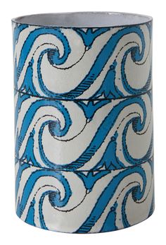 a roll of blue and white tape with swirls on it