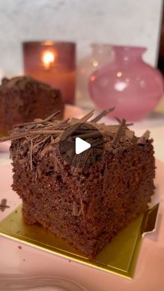 two pieces of chocolate cake on a plate