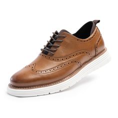 PRICES MAY VARY. Classic Design: Elevate your style with our men's oxford shoe, boasting a timeless PU leather round toe with wingtip brogue detailing. This design effortlessly blends traditional elegance with contemporary flair. Comfortable Lining & Sole: Experience ultimate comfort with a soft fabric wrap around the ankle and heel, shielding sensitive areas from rubbing and blisters. The soft sole provides lightweight flexibility and much-needed cushioning with every step. Slip-Resistant Outso Dress Sneakers, Dress Shoes For Men, Sneakers Comfortable, Business Casual Shoes, Oxford Shoe, Rubber Patch, Oxford Sneakers, Sporty Dress, Oxford Shoes Men