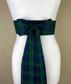 "Black Watch Tartan Sash  Black Watch Plaid Sash  Extra Long Black Watch Tartan Wedding Sash  Black Watch Tartan Accessories  Satin Swank Make this Satin Swank® waist sash in Black Watch tartan the perfect finishing touch for your Scottish wedding, bridesmaid, or special occasion dress...or just the right piece to add instant polish to your dress or top. This extra long version is three inches wide, 120 inches long, and will wrap around most waist sizes two times with a generous length remaining to tie in a bow or a simple knot with long-hanging tails. Those with smaller waists may be able to wrap this sash around three times. Tie in front, in back, or on the side. A double layer of yarn-dyed cotton twill fabric in Black Watch tartan on both sides. Sash is constructed (hand cut & sewn by S Black Watch Tartan Wedding, Tartan Sash, Black Watch Plaid, Tartan Wedding, Tartan Accessories, Christmas Attire, Black Watch Tartan, Waist Sash, Scottish Wedding