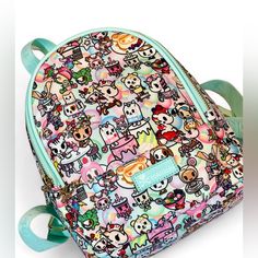 Tokidoki Sweet Cafe Mini Backpack Spring 2023 Like New/Never Used Condition. Clean And Ready To Carry On! - Zippered Main Compartment - Exterior: One Zippered Pocket On The Front - Interior: One Zippered Pocket - Adjustable Jacquard-Woven Tokidoki Logo Print Backpack Straps - Top Handle - Ice Blue Pu Logo Patch On The Front - Tokidoki Logo Zipper Pulls - Lime Colored Lining - Gold Tone Hardware - Size (Approximate): 10.25" H X 8.25" W X 3.75" D - Shell And Lining: 100% Polyester *Zoom In On Pix Casual Pink Bag With Cartoon Print, Cute Travel Backpack With Cartoon Print, Cute Cartoon Print Backpack For Travel, Kawaii Cartoon Print Backpack, Cute Cartoon Print Travel Backpack, Cute School Backpack With Cartoon Print, Pink Bags With Cartoon Print For Daily Use, Kawaii Backpack For Everyday Use, Pink Cartoon Print Bag For Everyday Use