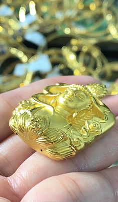 Vintage 24K 9999 Pure Gold Buddha Pendant....Marked 9999...Total of weights 9.8grams...Measure Include the Bail H 1 5/8'' W 1 1/8''...It's in very good condition. Luxury Carved Gold Necklace, Luxury Carved Gold Jewelry, Traditional Gold Carved Necklace, Gold Carved Jewelry As Gift, Gold Buddha, Buddha Pendant, Pure Gold, Pendant Necklaces, Necklaces