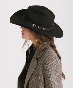 The Dean Western Hat features a pinched crown and a natural mid-length upturned brim with an attached tonal leather band + silver buckle detailing. The Dean is a classic timeless style hat with a touch of modern refinement. Classic Curved Brim Hat For Fall, Classic Flat Crown Hat Bands For Fall, Classic Riding Hat With Curved Brim, Classic Black Riding Hat, Elegant Fedora With Curved Brim For Rodeo, Elegant Wide Brim Fedora For Rodeo, Elegant Flat Brim Hat Band For Country Events, Classic Riding Hat With Short Brim, Classic Short Brim Riding Hat