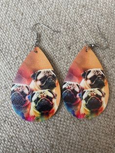 These adorable faux leather pug earrings are perfect for that dog fan in your life! These are medium-large sized teardrop shapes earrings and are finished with ear wire to fit perfectly into your earlobes!  Like what you see? View more at: https://www.etsy.com/shop/StephsCraftingBits **NOT RESPONSIBLE FOR SHIPPING DELAYS THROUGH SHIPPING CARRIER (USPS Earrings Animals, Pug Earrings, Pug Mom, Animals Dogs, Dog Earrings, Earrings Teardrop, Faux Leather Earrings, Dangly Earrings, Leather Earrings