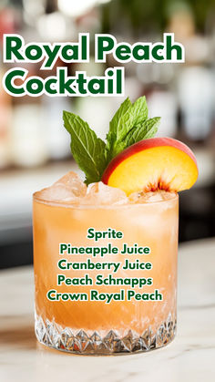 a cocktail with an apple and mint garnish on the side