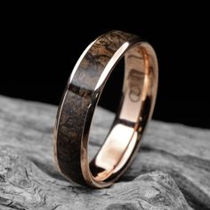 a wedding ring with an antelope inlay