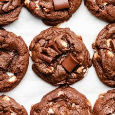 chocolate cookies with marshmallows on top and the words hot chocolate cookies above them