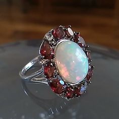 Rare Size 14 X 10 Mm Ethiopian Opal, Garnet And Topaz Sterling Ring Designed By Paul Deasy. 3.5 Carots Of Garnet.. Appraised $855!!!!! True Halo Affect Totally Natural. Never Worn!! Ruby And Opal Ring, Red Garnet Ring, 7 Rings, Ring Color, Garnet Rings, Opal Ring, Red Garnet, Opal Rings, Womens Jewelry Rings