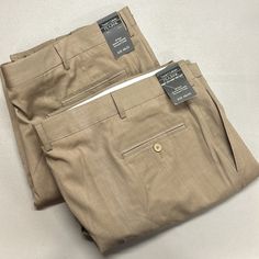 Brand New With Waist Tag Jos A Banks All Wool Dress Pants Slacks Traveler's Collection Tan Khaki Light Brown Men's Big & Tall Size 48 X 30 - Measures Approximately 24” Waist X 13” Rise X 30” Inseam X 9.5” Cuff Of Leg. Size 48 X 32 - Measures Approximately 24” Waist X 13” Rise X 32” Inseam X 9.75” Cuff Of Leg. I Also Have These Sizes In Black, If You Want To Check Out My Closet. Bundle Together And Save On Shipping Costs. Comes From A Clean And Smoke Free Home! Beige Flat Front Pants For Business Casual, Beige Flat Front Dress Pants With Welt Pockets, Beige Flat Front Dress Pants With Pockets, Beige Semi-formal Bottoms With Welt Pockets, Khaki Straight-leg Pants With Welt Pockets, Wool Dress, Pair Of Pants, Mens Big And Tall, Big & Tall