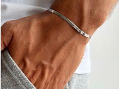 Add a touch of elegance to your outfit with our Men's Stainless Steel Italian Chain Bracelet! 💪✨ Crafted from durable stainless steel, this bracelet features a sleek, silver Italian chain design that's perfect for any occasion. 🔹 Size: 17 cm + 5 cm extension chain 🔹 Material: High-quality Stainless Steel 🔹 Color: Classic Silver 🔹 Adjustable: Fits most wrist sizes comfortably Whether you're dressing up for a special event or just adding a stylish accessory to your everyday look, this bracele Old Money Bracelet Men, Men’s Bracelet, Silver Mens Bracelet, Boys Bracelets, Italian Chain, Mens Bracelet Silver, Chain Design, Chain Link Bracelet, Stylish Accessories