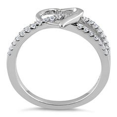 Top of ring height: 8.5mm

         Top of ring width: 9.6mm

      Band width:  4.8mm

      Shank width: 1.9mm

    
        Stone material:  clear cubic zirconia  

      Stone shape:  round

      Total number of CZ    stones: 33

      Stone setting:  prong setting

   
       Metal:  925 sterling silver

      Plating:  rhodium plated    (what is rhodium?) What is Rhodium? 
 
   If you're not familiar with Rhodium, it's a rare metal in the platinum   group, and at over $20,000 pe Stone Setting, Cute Rings, Cz Ring, Sterling Silver Heart, Cz Stone, Stone Settings, Silver Heart, Sterling Ring, Rhodium Plated