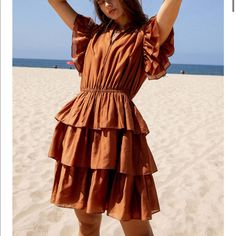 Size: Xs, Sold Out Online. Incredible Dress, Just Don’t Have An Occasion To Wear It To:( Chic Flutter Sleeve Mini Dress For Beach, Summer Beach Ruffle Dress With Flutter Sleeves, Brown Ruffled Mini Dress With Short Sleeves, Brown Ruffled Short Sleeve Mini Dress, Brown Short Sleeve Mini Dress With Ruffles, Brown Mini Dress With Ruffles And Short Sleeves, Brown Tiered Midi Dress For Summer, Summer Ruffle Dress With Flutter Sleeve For Beach, Brown Ruffled Dress For Day Out