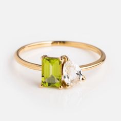 14kt Peridot and Topaz Toi et Moi Ring | Local Eclectic Radiant Cut Ring, Ring For Mom, Ring Green Stone, Radiant Cut Rings, Stone Wedding Ring, Green Stone Ring, August Birthstone Ring, Mothers Ring, Local Eclectic