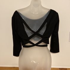 Baluoke Boutique Brand Sexy Black Crop Top Medium Very Nice Crop Top With Open Back Cross Cross Straps Please See Measurements In Pics To See If It Will Fit You __ Offers & Bundle Offers Welcome Non Smokers Pet Friendly Location Women’s Bin Sexy Black Cross Cross Open Back Top New Medium Black V-neck Crop Top With Built-in Bra, Fitted Bandage Top For Party, Fitted Cropped Blouse For Night Out, Black Tops With Built-in Bra For Club, Black V-neck Club Tops, Chic Low-cut Crop Top For Party, Edgy Backless Party Top, Spring Party Low-cut Crop Top, Evening Crop Top With Built-in Bra For Spring