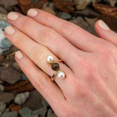 This wonderful three pearl ring is crafted of 14k yellow gold and features cultured saltwater pearls, one darker in color, and two light in color. The ring is currently a size 6.25. There is some very light epoxy visible around the base of the pearls. Three Pearl Ring, Estate Ring, Trio Ring, Brand Presentation, Estate Rings, Saltwater Pearls, Old Boxes, December Birthstone, The Ring