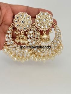 White gold Pearl Kundan chandbali Earrings, White chandbali earrings, Indian pakistani wedding jewelry, bridesmaid gift Indian Earrings/pearl Earring/Pakistani Earrings/Statement Earrings/Long chandelier/bridal earrings/Indian wedding Height = 82 mm || Width = 68 mm Trendy Earring Indo Western Earring Arrives in a gift box Color, shades, texture displayed may slightly vary from the actual product due to digital image limitations. We request you to consider these minor variations. Please expect the possibility of some slight imperfections when buying handmade jewelry. If you have any questions, please contact us. Chandbali Bridal Earrings With Intricate Design For Eid, Gold Chandbali Earrings For Celebration, Eid Chandbali Bridal Earrings With Intricate Design, Gold Chandbalis For Celebrations, Eid Bridal Chandbali Earrings With Intricate Design, Eid Chandbali Chandelier Earrings With Intricate Design, Gold Meenakari Chandbalis For Wedding, Heavy Chandbali Chandbalis For Celebration, Intricately Designed Chandbalis For Festivals