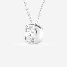 The soft edges of this cushion cut lab grown diamond are held tightly in a bezel setting.  Meant to be worn every day, feel free to wear this with jeans or your favorite dress. Modern Jewelry With Diamond Cushion Cut, Modern Cushion Cut Diamond White Jewelry, Modern Cushion Cut White Gold Jewelry, Luxury Solitaire Necklace With Bezel Setting, Timeless White Cushion Cut Jewelry, Modern Cushion Cut Cubic Zirconia Jewelry, White Cushion Cut Single Cut Diamond Jewelry, White Cushion Cut Single Diamond Jewelry, White Asscher Cut Jewelry With Bezel Setting