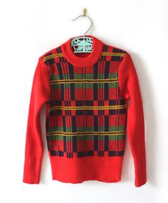 FRENCH VINTAGE 70's, very nice patterned sweater, soft stretchy knit ( acrylic and wool blend ), fully fashioned, geometric pattern. Brand " Marie Lecoeur - Paris " ( French brand but made in Italy ). Size 4 years Vintage condition level 5, new old stock ( washed once ) We assess the condition of our vintage items on a scale from 0 to 5. Level 5 corresponds to an almost new vintage condition. Any defects are systematically reported. Even though in very good condition, vintage items may present i Retro Long Sleeve Argyle Sweater, Retro Fall Sweater, Retro Plaid Sweater For Fall, Vintage Patterned Winter Sweater, Vintage Fair Isle Patterned Sweater, Vintage Jacquard Knit Sweater, Retro Argyle Pattern Crew Neck Sweater, Retro Crew Neck Argyle Sweater, Retro Jacquard Knit Sweater For Fall